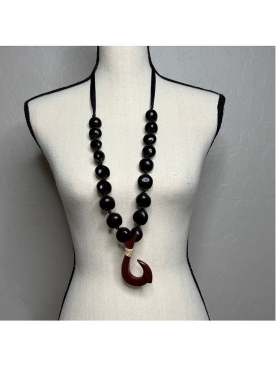 Handmade Jewelry - black kukui nut lei with a wooden fish hook pendant